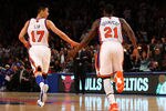NEW YORK, NY - FEBRUARY 10:  (L-R) Jeremy Lin #17 and Iman Shumpert #21 of the New York Knicks celebrate a play against the Los Angeles Lakers at Madison Square Garden on February 10, 2012 in New York City.  NOTE TO USER: User expressly acknowledges and agrees that, by downloading and or using this photograph, User is consenting to the terms and conditions of the Getty Images License Agreement.  (Photo by Chris Chambers/Getty Images)
