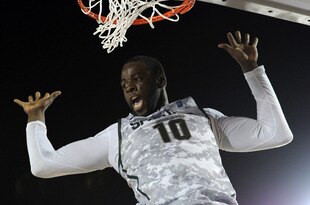 CORONADO, CA - NOVEMBER 11:  Draymond Green #10 of the Michigan State Spartans reacts after her dunk against the North Carolina Tar Heels during the Quicken Loans Carrier Classic on board the USS Carl Vinson on November 11, 2011 in Coronado, California.  (Photo by Harry How/Getty Images)