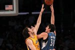 LOS ANGELES - NOVEMBER 9:  Darko Milicic #31 of the Minnesota Timberwolves shoots over Pau Gasol #16 of the Los Angeles Lakers at Staples Center on November 9, 2010 in Los Angeles, California.   NOTE TO USER: User expressly acknowledges and agrees that, by downloading and or using this photograph, User is consenting to the terms and conditions of the Getty Images License Agreement. (Photo by Stephen Dunn/Getty Images)