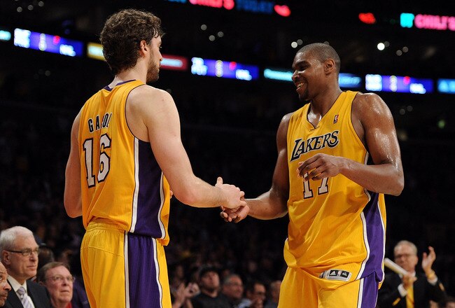 LOS ANGELES, CA - APRIL 20:  Pau Gasol #16 and Andrew Bynum #17 of the Los Angeles Lakers celebrate as Bynum comes to the bench while taking on the New Orleans Hornets in Game Two of the Western Conference Quarterfinals in the 2011 NBA Playoffs on April 20, 2011 at Staples Center in Los Angeles, California. NOTE TO USER: User expressly acknowledges and agrees that, by downloading and or using this photograph, User is consenting to the terms and conditions of the Getty Images License Agreement.  (Photo by Harry How/Getty Images)