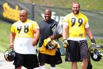 LATROBE, PA - JULY 29: Casey Hampton #98, James Harrison #92, and Brett Keisel #99 of the Pittsburgh Steelers walk down to the field during training camp on July 29, 2011 at St Vincent College in Latrobe, Pennsylvania.  (Photo by Jared Wickerham/Getty Images)