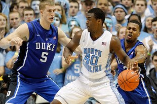 CHAPEL HILL, NC - FEBRUARY 08:  Harrison Barnes #40 of the North Carolina Tar Heels and Mason Plumlee #5 of the Duke Blue Devils during their game at the Dean Smith Center on February 8, 2012 in Chapel Hill, North Carolina.  (Photo by Streeter Lecka/Getty Images)