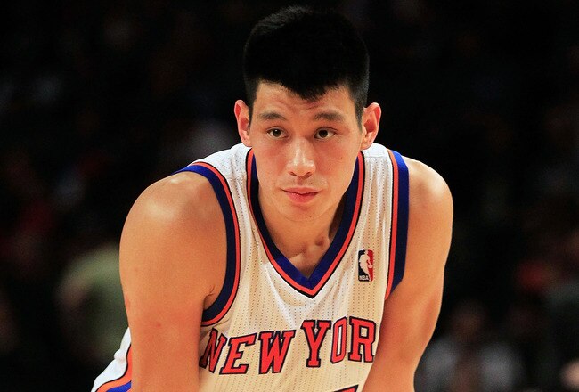 NEW YORK, NY - FEBRUARY 15:  Jeremy Lin #17 of the New York Knicks looks on against the Sacramento Kings at Madison Square Garden on February 15, 2012 in New York City. NOTE TO USER: User expressly acknowledges and agrees that, by downloading and/or using this Photograph, user is consenting to the terms and conditions of the Getty Images License Agreement.  (Photo by Chris Trotman/Getty Images)