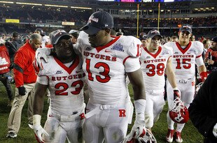 NEW YORK - DECEMBER 30:  Jawan Jamison #23 and Paul Hamersma #13 of the Rutgers Scarlet Knights celebrate a win over the Iowa State Cyclones in the New Era Pinstripe Bowl at Yankee Stadium on December 30, 2011 in the Bronx Borough of New York City.  (Photo by Jeff Zelevansky/Getty Images)