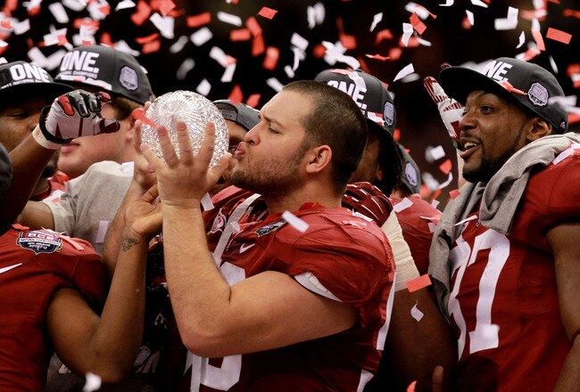 NEW ORLEANS, LA - JANUARY 09:  Nick Gentry #58 and the Alabama Crimson Tide celebrate after defeating Louisiana State University Tigers in the 2012 Allstate BCS National Championship Game at Mercedes-Benz Superdome on January 9, 2012 in New Orleans, Louisiana. Alabama  won the game by a score of 21-0.  (Photo by Ronald Martinez/Getty Images)