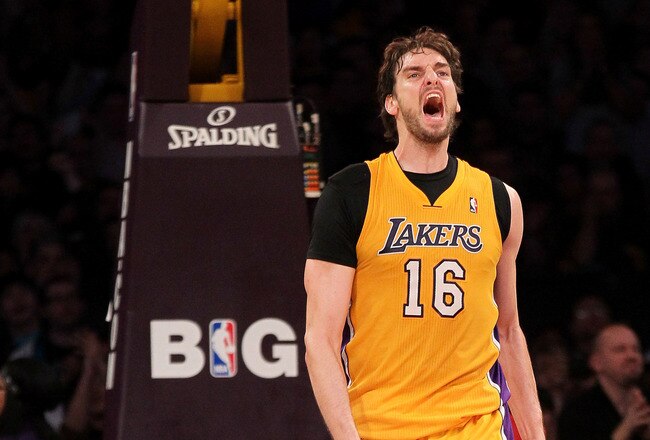 LOS ANGELES, CA - DECEMBER 27:  Pau Gasol #16 of the Los Angeles Lakers celebrates after making a basket in the second quarter against the Utah Jazz at Staples Center on December 27, 2011 in Los Angeles, California.  The Lakers won 96-71.  NOTE TO USER: User expressly acknowledges and agrees that, by downloading and or using this photograph, User is consenting to the terms and conditions of the Getty Images License Agreement.  (Photo by Stephen Dunn/Getty Images)