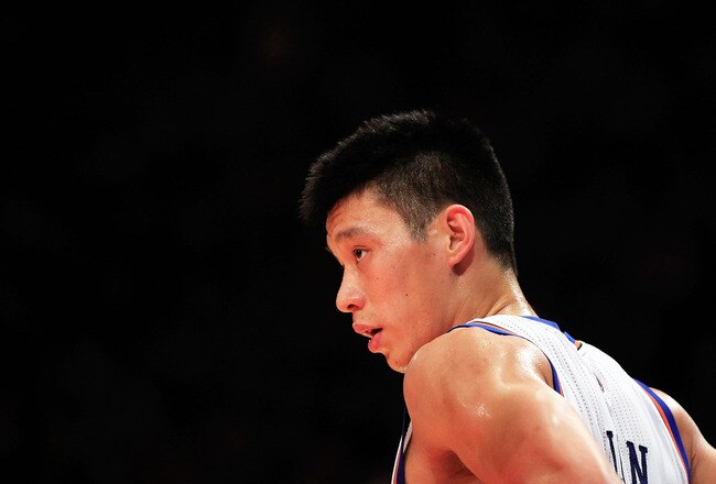 NEW YORK, NY - FEBRUARY 15:  Jeremy Lin #17 of the New York Knicks looks on against the Sacramento Kings at Madison Square Garden on February 15, 2012 in New York City. NOTE TO USER: User expressly acknowledges and agrees that, by downloading and/or using this Photograph, user is consenting to the terms and conditions of the Getty Images License Agreement.  (Photo by Chris Trotman/Getty Images)