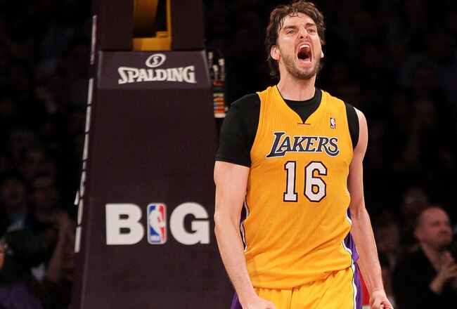 LOS ANGELES, CA - DECEMBER 27:  Pau Gasol #16 of the Los Angeles Lakers celebrates after making a basket in the second quarter against the Utah Jazz at Staples Center on December 27, 2011 in Los Angeles, California.  The Lakers won 96-71.  NOTE TO USER: User expressly acknowledges and agrees that, by downloading and or using this photograph, User is consenting to the terms and conditions of the Getty Images License Agreement.  (Photo by Stephen Dunn/Getty Images)