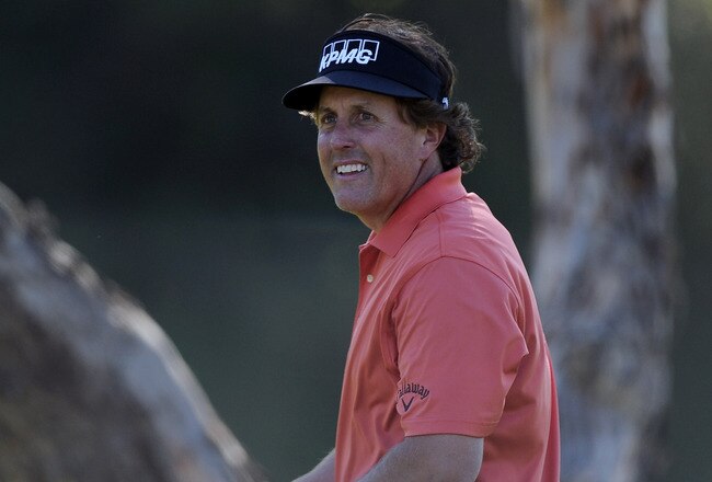 PACIFIC PALISADES, CA - FEBRUARY 16:  Phil Mickelson smiles after his birdie on the seventh hole during the first round of the Northern Trust Open at the Riviera Country Club on February 16, 2012 in Pacific Palisades, California.  (Photo by Harry How/Getty Images)