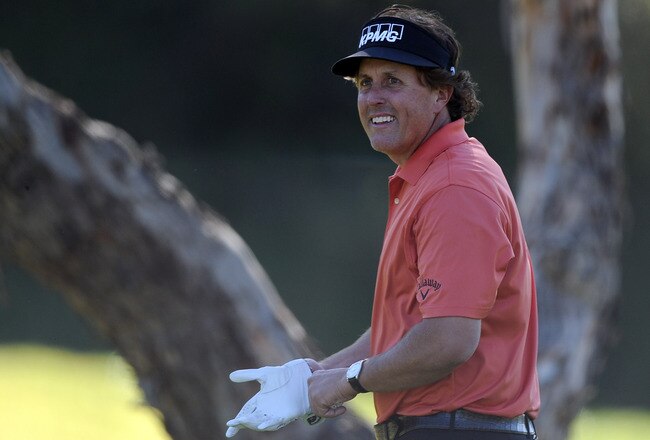 PACIFIC PALISADES, CA - FEBRUARY 16:  Phil Mickelson smiles after his birdie on the seventh hole during the first round of the Northern Trust Open at the Riviera Country Club on February 16, 2012 in Pacific Palisades, California.  (Photo by Harry How/Getty Images)