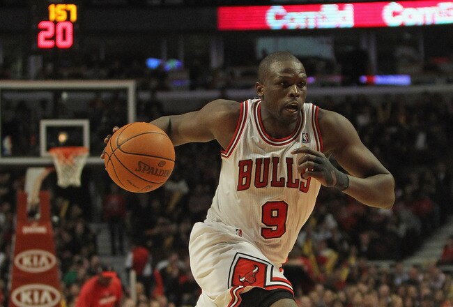 CHICAGO, IL - FEBRUARY 14: Loul Deng #9 of the Chicago Bulls drives against the Sacramento Kings at the United Center on February 14, 2012 in Chicago, Illinois. The Bulls defeated the Kings 121-115. NOTE TO USER: User expressly acknowledges and agrees that, by downloading and or using this photograph, User is consenting to the terms and conditions of the Getty Images License Agreement. (Photo by Jonathan Daniel/Getty Images)