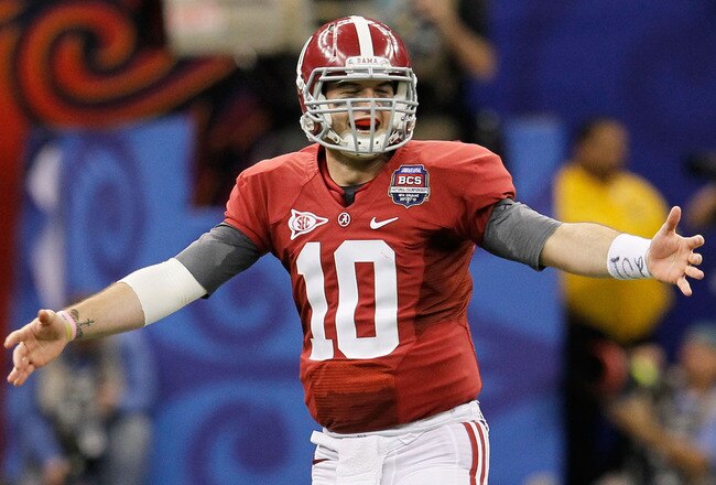 NEW ORLEANS, LA - JANUARY 09:  AJ McCarron #10 of the Alabama Crimson Tide celebrates after a touchdown late in the fourth quarter against the Louisiana State University Tigers during the 2012 Allstate BCS National Championship Game at Mercedes-Benz Superdome on January 9, 2012 in New Orleans, Louisiana.  (Photo by Kevin C. Cox/Getty Images)