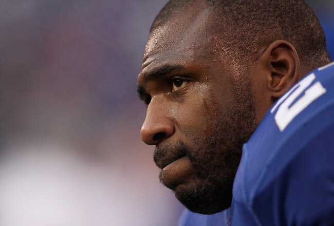EAST RUTHERFORD, NJ - JANUARY 08:  Brandon Jacobs #27 of the New York Giants looks on against the Atlanta Falcons during their NFC Wild Card Playoff game at MetLife Stadium on January 8, 2012 in East Rutherford, New Jersey.  (Photo by Nick Laham/Getty Images)