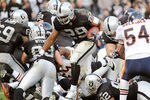 OAKLAND, CA - NOVEMBER 27:  Michael Bush #29 of the Oakland Raiders rushes three yards for a touchdown against the Chicago Bears at O.co Coliseum on November 27, 2011 in Oakland, California.  (Photo by Thearon W. Henderson/Getty Images)