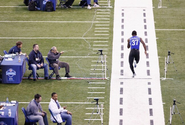 INDIANAPOLIS, IN - MARCH 1: Defensive back Patrick Peterson #37 of LSU runs the 40-yard dash during the 2011 NFL Scouting Combine at Lucas Oil Stadium on February 28, 2011 in Indianapolis, Indiana. (Photo by Joe Robbins/Getty Images)