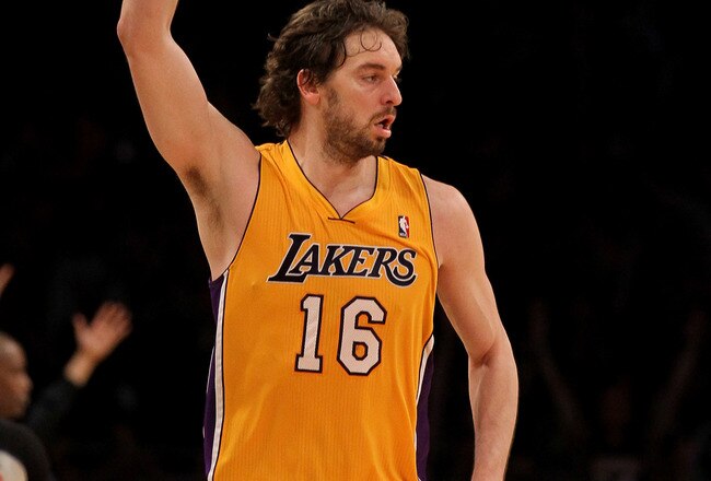 LOS ANGELES, CA - FEBRUARY 14:  Pau Gasol #16 of the Los Angeles Lakers celebrates after making a three point basket against the Atlanta Hawks at Staples Center on February 14, 2012 in Los Angeles, California.  The Lakers won 86-78.  NOTE TO USER: User expressly acknowledges and agrees that, by downloading and or using this photograph, User is consenting to the terms and conditions of the Getty Images License Agreement.  (Photo by Stephen Dunn/Getty Images)