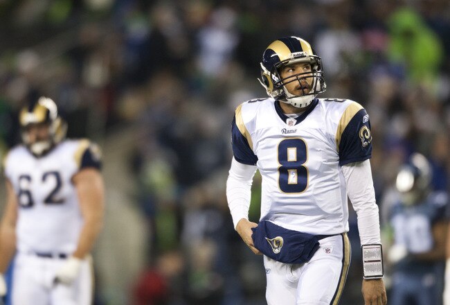 SEATTLE, WA - DECEMBER 12:  Sam Bradford #8 of the St. Louis Rams leaves the field after an unsuccessful attempt for a first down against the Seattle Seahawks at CenturyLink Field December 12, 2011 in Seattle, Washington. Seattle won 33-13. (Photo by Jay Drowns/Getty Images)