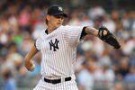 NEW YORK, NY - JUNE 08:  A.J. Burnett #34 of the New York Yankees pitches against the Boston Red Sox during their game on June 8, 2011 at Yankee Stadium in the Bronx borough of New York City.  (Photo by Al Bello/Getty Images)