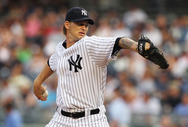 NEW YORK, NY - JUNE 08:  A.J. Burnett #34 of the New York Yankees pitches against the Boston Red Sox during their game on June 8, 2011 at Yankee Stadium in the Bronx borough of New York City.  (Photo by Al Bello/Getty Images)