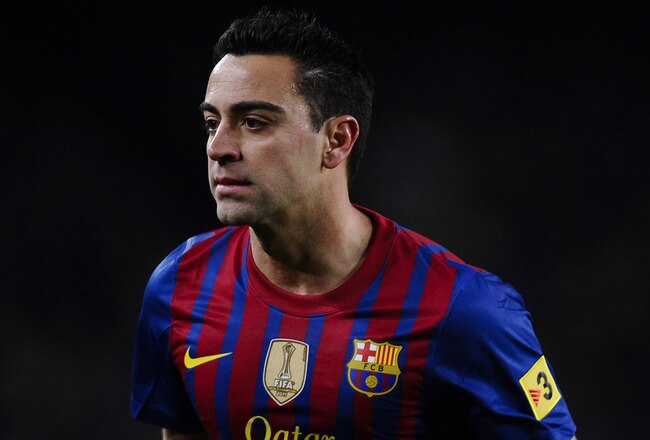 BARCELONA, SPAIN - FEBRUARY 08:  Xavi Hernandez of FC Barcelona looks on during the Copa del Rey Semi Final 2nd leg match between FC Barcelona and Valencia  at Nou Camp on February 8, 2012 in Barcelona, Spain.  (Photo by David Ramos/Getty Images)