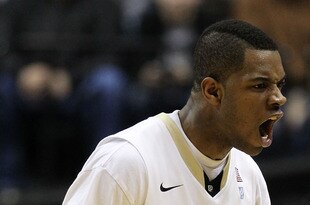 INDIANAPOLIS, IN - MARCH 11:  Kelsey Barlow #12 of the Purdue Boilermakers reacts against the Michigan State Spartans during the quarterfinals of the 2011 Big Ten Men's Basketball Tournament at Conseco Fieldhouse on March 11, 2011 in Indianapolis, Indiana. Michigan State won 74-56.  (Photo by Andy Lyons/Getty Images)