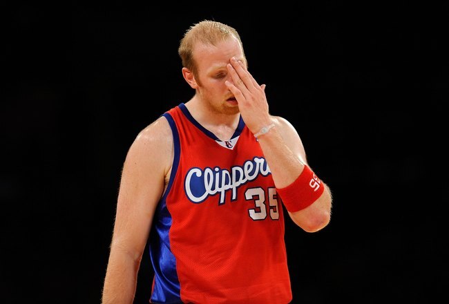 LOS ANGELES, CA - OCTOBER 27:  Chris Kaman #35 of the Los Angeles Clippers stands on the court during the season opening game against the Los Angeles Lakers at Staples Center on October 27, 2009 in Los Angeles, California.  The Lakers won 99-92.  NOTE TO USER: User expressly acknowledges and agrees that, by downloading and or using this photograph, User is consenting to the terms and conditions of the Getty Images License Agreement. Mandatory Copyright Notice: Copyright 2009 NBAE  (Photo by Kevork Djansezian/Getty Images)