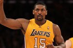 LOS ANGELES, CA - FEBRUARY 14:  Metta World Peace #15 of  the Los Angeles Lakers celebrates during the game with the Atlanta Hawks at Staples Center on February 14, 2012 in Los Angeles, California.  The Lakers won 86-78.  NOTE TO USER: User expressly acknowledges and agrees that, by downloading and or using this photograph, User is consenting to the terms and conditions of the Getty Images License Agreement.  (Photo by Stephen Dunn/Getty Images)