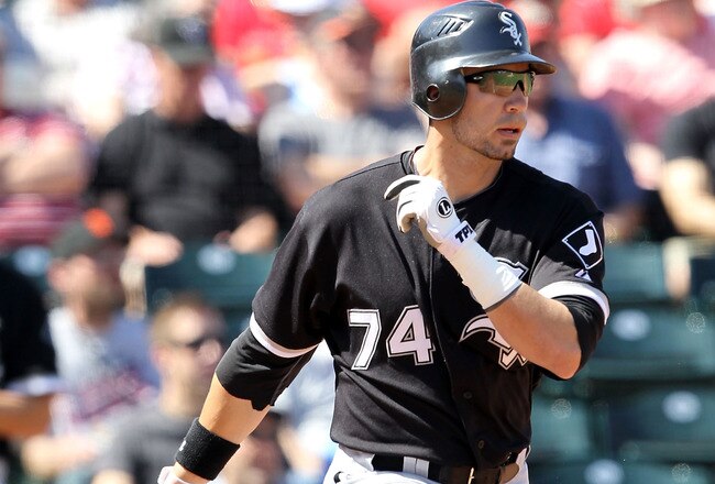 TEMPE, AZ - MARCH 12:  Josh Kroeger #74 of the Chicago White Sox hits a RBI triple against the Los Angeles Angels of Anaheim during the second inning of the MLB spring training game at Tempe Diablo Stadium on March 12, 2010 in Tempe, Arizona.  (Photo by Christian Petersen/Getty Images)