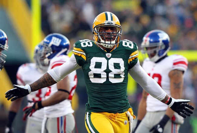 GREEN BAY, WI - JANUARY 15:  Jermichael Finley #88 of the Green Bay Packers reacts after a play against the New York Giants during their NFC Divisional playoff game at Lambeau Field on January 15, 2012 in Green Bay, Wisconsin.  (Photo by Jamie Squire/Getty Images)