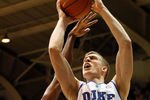 DURHAM, NC - FEBRUARY 16:  Mason Plumlee #5 of the Duke Blue Devils drives to the basket on the North Carolina State Wolfpack during their game at Cameron Indoor Stadium on February 16, 2012 in Durham, North Carolina.  (Photo by Streeter Lecka/Getty Images)