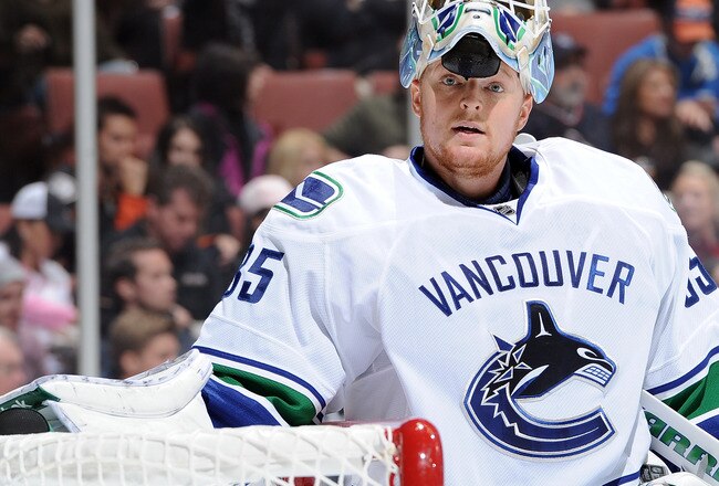 ANAHEIM, CA - DECEMBER 29:  Cory Schneider #35 of the Vancouver Canucks takes a break in goall against the Anaheim Ducks at Honda Center on December 29, 2011 in Anaheim, California.  (Photo by Harry How/Getty Images)