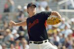 SCOTTSDALE, AZ - MARCH 6: Pitcher Matt Cain #18 of the San Francisco Giants throws a pitch against the Los Angeles Angels of Anaheim during Spring Training on March 6, 2007 at Scottsdale Stadium in Scottsdale, Arizona. (Photo by Stephen Dunn/Getty Images)