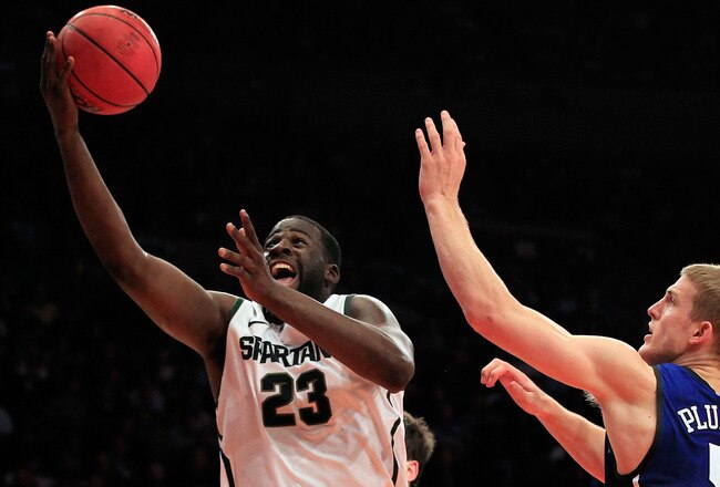 NEW YORK - NOVEMBER 15: Draymond Green #23 of the Michigan State Spartens drives to the basket against Mason Plumlee #5 of the Duke Blue Devils 5quare Garden on November 15, 2011 in New York City.  (Photo by Chris Trotman/Getty Images)