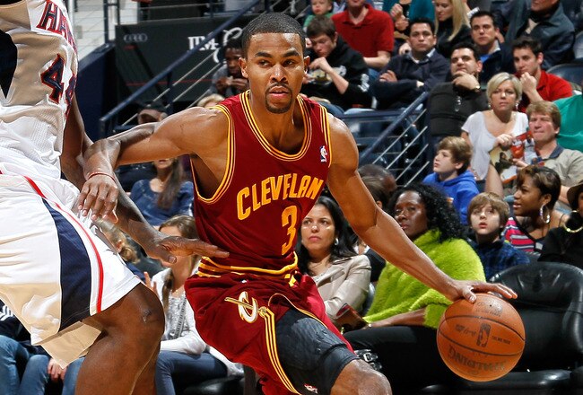 ATLANTA, GA - JANUARY 21:  Ramon Sessions #3 of the Cleveland Cavaliers against Ivan Johnson #44 of the Atlanta Hawks at Philips Arena on January 21, 2012 in Atlanta, Georgia.  NOTE TO USER: User expressly acknowledges and agrees that, by downloading and or using this photograph, User is consenting to the terms and conditions of the Getty Images License Agreement.  (Photo by Kevin C. Cox/Getty Images)