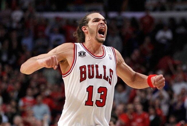 CHICAGO, IL - MAY 15:  Joakim Noah #13 of the Chicago Bulls reacts against the Miami Heat in Game One of the Eastern Conference Finals during the 2011 NBA Playoffs on May 15, 2011 at the United Center in Chicago, Illinois. NOTE TO USER: User expressly acknowledges and agrees that, by downloading and or using this photograph, User is consenting to the terms and conditions of the Getty Images License Agreement  (Photo by Gregory Shamus/Getty Images)