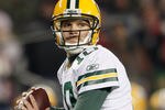 FOXBORO, MA - DECEMBER 19:  Quarterback Matt Flynn #10 of the Green Bay Packers looks to pass during the third quarter of the game against the New England Patriots at Gillette Stadium on December 19, 2010 in Foxboro, Massachusetts. The Patriots won the game 31-27.  (Photo by Elsa/Getty Images)
