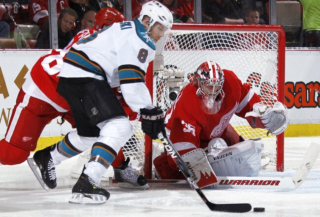 DETROIT - MAY 6: Jimmy Howard #35 of the Detroit Red Wings gets ready to block a shot from Joe Pavelski #8 of the San Jose Sharks during the third period in Game Four of the Western Conference Semifinals during the 2011 NHL Stanley Cup Playoffs on May 6, 2011 at Joe Louis Arena in Detroit, Michigan. Detroit won the game 4-3. San Jose leads the series 3-1. (Photo by Gregory Shamus/Getty Images)