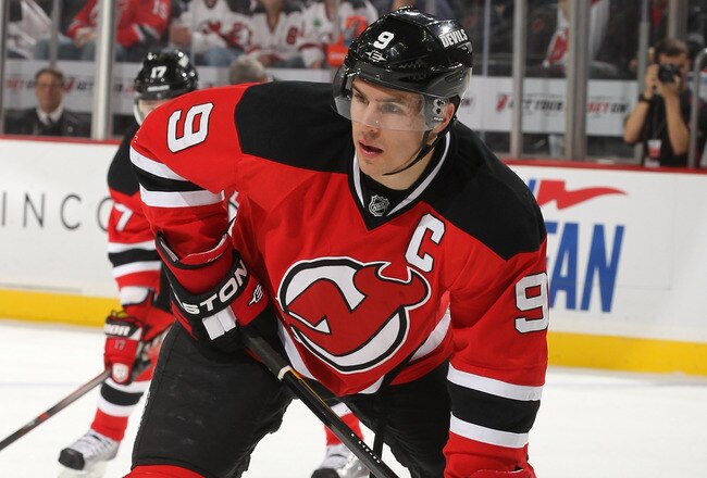 NEWARK, NJ - NOVEMBER 26: Zach Parise #9 of the New Jersey Devils  in action against the New York Islanders on November 26, 2011 at The Prudential Center in Newark, New Jersey  (Photo by Al Bello/Getty Images)