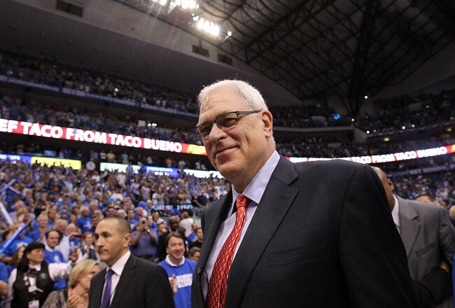 DALLAS, TX - MAY 08:  Head coach Phil Jackson of the Los Angeles Lakers leaves court after a loss against the Dallas Mavericks in Game Four of the Western Conference Semifinals during the 2011 NBA Playoffs on May 8, 2011 at American Airlines Center in Dallas, Texas.  The Mavericks won 4-0 games against the Lakers and advanced to the Western Conference Finals. NOTE TO USER: User expressly acknowledges and agrees that, by downloading and or using this photograph, User is consenting to the terms and conditions of the Getty Images License Agreement.  (Photo by Ronald Martinez/Getty Images)