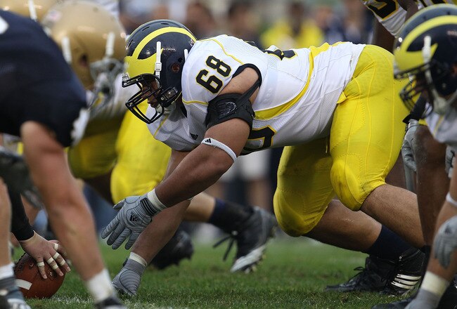 SOUTH BEND, IN - SEPTEMBER 11: Mike Martin #68 of the Michigan Wolverines awaits the start of play against the Notre Dame Fighting Irish at Notre Dame Stadium on September 11, 2010 in South Bend, Indiana. Michigan defeated Notre Dame 28-24.  (Photo by Jonathan Daniel/Getty Images)