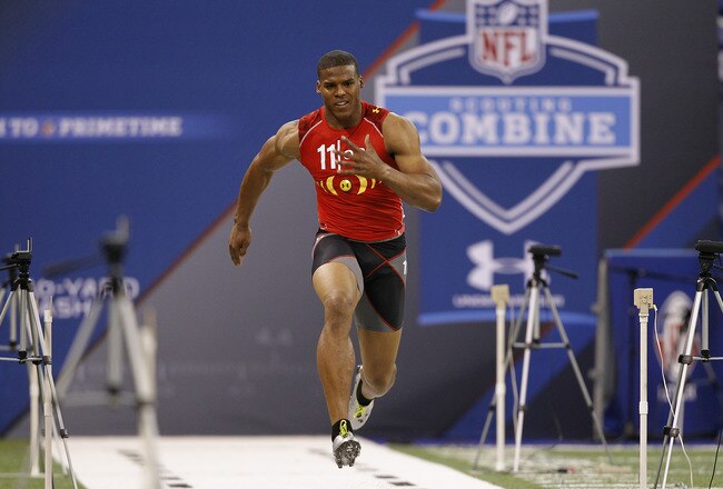 INDIANAPOLIS, IN - FEBRUARY 27: Cam Newton runs the 40-yard dash during the 2011 NFL Scouting Combine at Lucas Oil Stadium on February 27, 2011 in Indianapolis, Indiana. (Photo by Joe Robbins/Getty Images)