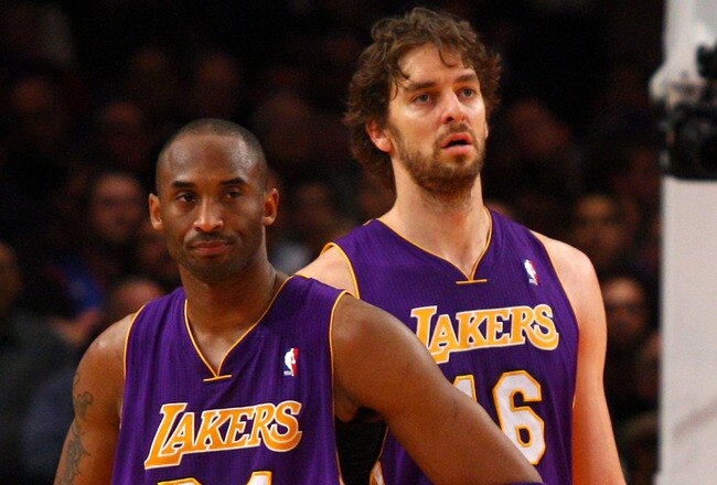 NEW YORK, NY - FEBRUARY 10: (L-R) Kobe Bryant #24 and Pau Gasol #16 of the Los Angeles Lakers look on against the New York Knicks at Madison Square Garden on February 10, 2012 in New York City.  NOTE TO USER: User expressly acknowledges and agrees that, by downloading and or using this photograph, User is consenting to the terms and conditions of the Getty Images License Agreement.  (Photo by Chris Chambers/Getty Images)