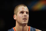 DENVER, CO - MARCH 02:  Joel Pryzbilla #10 of the Charlotte Bobcats takes a free throw against the Denver Nuggets at the Pepsi Center on March 2, 2011 in Denver, Colorado. The Nuggets defeated the Bobcats 120-80.NOTE TO USER: User expressly acknowledges and agrees that, by downloading and or using this photograph, User is consenting to the terms and conditions of the Getty Images License Agreement.  (Photo by Doug Pensinger/Getty Images)