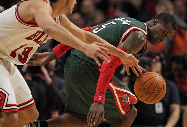CHICAGO, IL - JANUARY 27: Joakim Noah #13 of the Chicago Bulls knocks the ball away from Stephen Jackson #5 of the Milwaukee Bucks at the United Center on January 27, 2012 in Chicago, Illinois. The Bulls defeated the Bucks 107-100. NOTE TO USER: User expressly acknowledges and agrees that, by downloading and or using this photograph, User is consenting to the terms and conditions of the Getty Images License Agreement. (Photo by Jonathan Daniel/Getty Images)