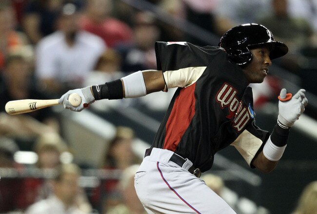 PHOENIX, AZ - JULY 10:  World Future's All-Star Jurickson Profar #10 of the Texas Rangers triples in the sixth inning during the 2011 XM All-Star Futures Game at Chase Field on July 10, 2011 in Phoenix, Arizona.  (Photo by Christian Petersen/Getty Images)