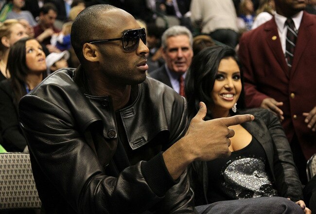 DALLAS - FEBRUARY 13:  Kobe Bryant #24 of the Los Angeles Lakers smiles with his wife Vanessa Lynne during the Taco Bell Skills Challenge on All-Star Saturday Night, part of 2010 NBA All-Star Weekend at American Airlines Center on February 13, 2010 in Dallas, Texas. NOTE TO USER: User expressly acknowledges and agrees that, by downloading and or using this photograph, User is consenting to the terms and conditions of the Getty Images License Agreement.  (Photo by Jed Jacobsohn/Getty Images)