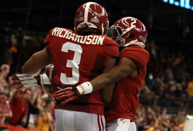 NEW ORLEANS, LA - JANUARY 09:  Trent Richardson #3 of the Alabama Crimson Tide celebrates with DeAndrew White #2 after scoring a touchdown in the fourth quarter against the Louisiana State University Tigers during the 2012 Allstate BCS National Championship Game at Mercedes-Benz Superdome on January 9, 2012 in New Orleans, Louisiana.  (Photo by Ronald Martinez/Getty Images)