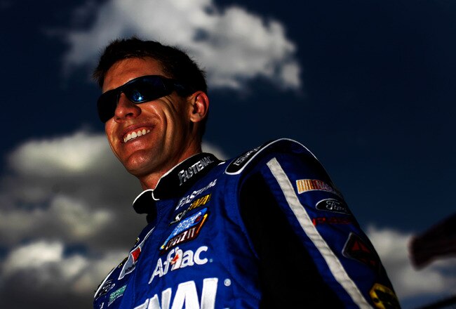 DAYTONA BEACH, FL - FEBRUARY 19:  Carl Edwards, driver of the #99 Fastenal Ford, after qualifying for the NASCAR Sprint Cup Series Daytona 500 at Daytona International Speedway on February 19, 2012 in Daytona Beach, Florida.  (Photo by Tom Pennington/Getty Images for NASCAR)