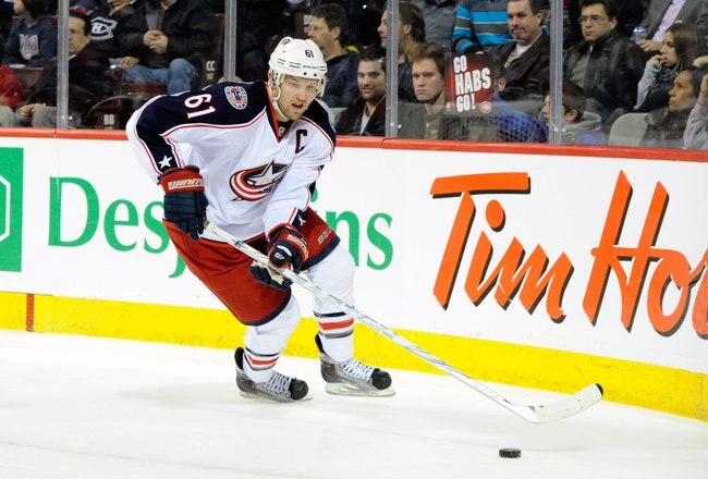 MONTREAL, CANADA - DECEMBER 6:  Rick Nash #61 of the Columbus Blue Jackets skates with the puck during the NHL game against the Montreal Canadiens at the Bell Centre on December 6, 2011 in Montreal, Quebec, Canada.  The Blue Jackets defeated the Canadiens 3-2 in a shootout.  (Photo by Richard Wolowicz/Getty Images)