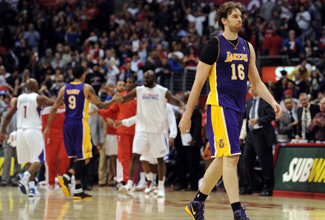 LOS ANGELES, CA - JANUARY 14:  Pau Gasol #16 of the Los Angeles Lakers leaves the court after a 102-94 Los Angeles Clippers win at Staples Center on January 14, 2012 in Los Angeles, California.  NOTE TO USER: User expressly acknowledges and agrees that, by downloading and/or using this Photograph, user is consenting to the terms and conditions of the Getty Images License Agreement.  (Photo by Harry How/Getty Images)
